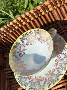 Source Unknown Pink and Gold Porcelain Teacup with Saucer